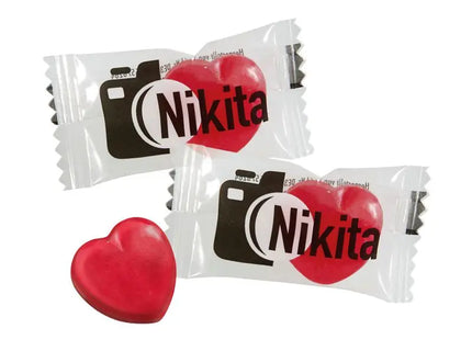 Herz-Bonbons in bedruckter Flowpack-Verpackung - Süße Aufmerksamkeit TK Gruppe® Grosshandel 
